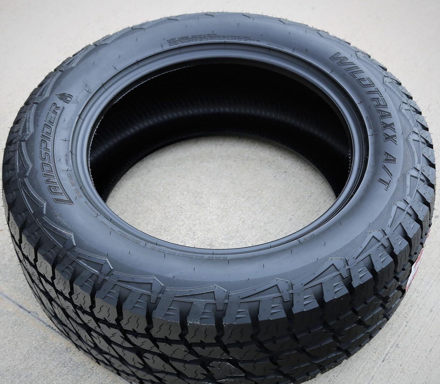 1737178103_Wildtraxx-AT-TruckSUV-All-Terrain-Off-Road-Radial-Tire-26565R18-2656518-26565-18-116T-Load-Range-XL-4-Ply-RWL-Raised-White-Letters.jpg